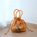 Traditional Chinese style silk embroidered drawstring handbag, perfect for Hanfu matching and gifts. - Orange