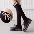 Black calf socks featuring elegant white pearl bow beading, stylish thin cotton spring wear. - One Size / Bow Pearl Plain Calf Socks / Black