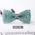 Sparkling green crystal bow tie close-up, elegant rhinestone design for wedding and formal wear. - Green
