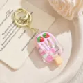 Cute strawberry ice cream quicksand keychain, clear resin bag charm for girls and gifts. - Creamy Candy Bean Ice Cream Charm - Purple / Light Gold Clasp + Strawberry Ice Cream
