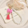 Catena di perle fiocco portachiavi telefono ciondolo carino nappa rosa borsa accessorio fai da te - Rosso rosa