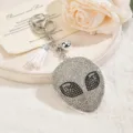 Glitzernder Strass Alien Schlüsselanhänger mit Quaste, Kristall Taschenanhänger. - Weiß