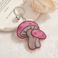 Llavero de hongo con diamantes de imitación, colgante de cristal brillante para bolsos de mujer. - Rosa