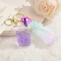 Akryl Treibsand Bubble Tea Tasse Schlüsselanhänger Süßer Taschenanhänger Schüler Modell - Schlüsselanhängerband + Leuchtende Milchteetasse / Leuchtende Lila Milchteetasse