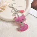Pink rhinestone fox keychain with cute tassel and metal ring for stylish bag purse accessory. - Pink