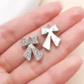 Sparkling rhinestone bow metal charm for DIY jewelry necklace bracelet making accessories. - Electroplated Thick Point Drill Bowknot (27086) / 1 Piece/Pack (19x13mm) / Silver