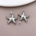 Ανοξείδωτα ατσάλινα κρεμαστά charms αστερία DIY κοσμήματα και αξεσουάρ θαλάσσιας ζωής - Θαλάσσιος Κοίλος Αστερίας σε Χρώμα Ατσαλιού (TA431) / Συσκευασία 1 Τεμαχίου (18x16x4.7mm) / Χρώμα Ατσαλιού