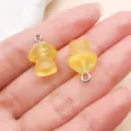 Pendentif champignon en résine jaune accessoire bijoux DIY, charm mignon pour artisanat. - Champignon Pailleté en Résine Jaune (24155)