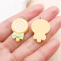Pendentif sucette en résine jaune DIY avec nœud pour accessoires de bijoux faits main. - Sucette Nœud en Résine Jaune (24474)
