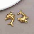 Colgante de delfín de oro de acero inoxidable para joyería DIY, diseño de vida marina bonita. - 1 Pieza (14x20x5mm)