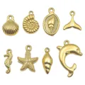 Gouden oceaanserie roestvrij staal bedels hangers zeester zeepaardje sieraden maken DIY - 8-Delige Set