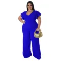 Detailed shot of the elegant blue flutter sleeve wide leg jumpsuit in a clean studio setting. - L / Set / Blue