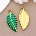 Gold and green enamel leaf pendant charms for DIY jewelry making and necklace crafting accessories. - Leaf (T1497) / 11x24x2mm (Aperture 2mm) / Green