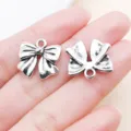 Antique silver bow charm alloy pendant DIY bracelet keychain jewelry accessories crafting parts. - Bowknot Style (24722) / 1 Piece (16x17x3mm) / Antique Silver