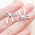 Antique silver hollow bow ribbon zinc alloy pendant for DIY bracelet and keychain accessories - Hollow Bowknot Style (26992) / 1 Piece/Pack (18x19mm) / Antique Silver