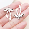 Antique silver bow ribbon charms zinc alloy pendants for DIY jewelry making bracelet keychains. - Bowknot Style (26994) / 1 Piece (30x21mm) / Antique Silver