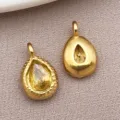 Stainless steel teardrop pendant DIY jewelry accessory with yellow crystal for necklaces and earrings. - Dark Champagne