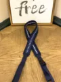 Close-up of a navy blue woven nylon bag strap with white pattern and adjustable buckle. - Navy Jacquard Wide Shoulder Strap