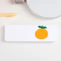 Detail shot of white plastic pencil case featuring cute 3D orange decoration, school supply design. - White-Orange