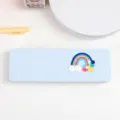 Close-up of light blue plastic pencil case featuring a cute 3D rainbow cloud detail. - Blue - Rainbow Cloud