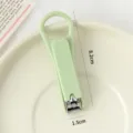 Tagliaunghie portatile color caramella in verde chiaro, compatto strumento per manicure. - Verde erba