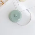 Mini cinta métrica nórdica, regla suave verde portátil para medir el cuerpo y la ropa. - Verde Nórdico
