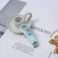 Cute portable cartoon nail clipper with blue bear design, mint green metal manicure tool. - Teddy Bear