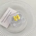 Transparante contactlenzendoos met gele strik, draagbare dubbele doos variant voor dagelijkse zorg. - Gele Strik
