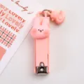 Süßer rosa Cartoon Nagelknipser mit Kaninchen Dekor und Enten Anhänger, tragbar, neu. - Rosa Gesicht Hase