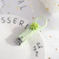 Cute cartoon green daisy nail clipper portable folding manicure tool for daily nail care. - Green Floral