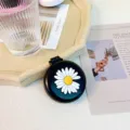 Portable folding mini hair brush with mirror and cute daisy design for daily use. - Daisy