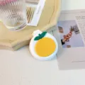 Portable folding air cushion hair brush with cute orange fruit design for daily hair care - Orange