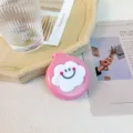 Portable foldable pocket hair brush with cute pink cloud smiley design for daily travel. - Cloud