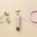 Beige cat paw nail clipper with cute pendant, minimalist candy color portable manicure tool. - Individual Packaging / Off-White Paw