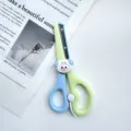 Cute cartoon children safety scissors for DIY craft hand account, blue and green color. - Puppy