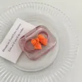 Schattige roze strik contactlenzen etui transparante draagbare dubbele doos voor oogzorg. - Oranje Strik
