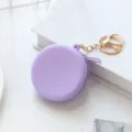 Purple silicone round coin purse with gold keychain and zipper for keys and earphones. - Simple Round - Purple