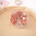 Rose gold stationery set including binder clips, paper clips, and push pins in a clear box. - Combination Set - Rose Gold
