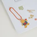 Cute cartoon metal keychain bag charm with orange bead chain and yellow bear pendant. - Bead Chain - Heart Bear