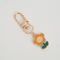Cute cartoon metal flower keychain, orange and yellow charm with gold-colored lobster clasp. - Hook Style - Little Flower