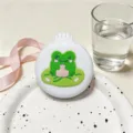 Portable folding air cushion hair brush with cute green frog design and handy makeup mirror. - White Frog