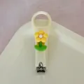 Cortauñas portátil bonito de estilo crema con decoración de flor amarilla de acero inoxidable. - Estilo crema - Flor pequeña