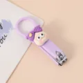 Süßer Cartoon Puppe Nagelknipser lila klappbares Manikürewerkzeug für Kinder und Damen - Mädchen mit lila Haaren
