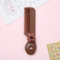 Mignon mini peigne à cheveux ours brun pour enfants, peigne de poche en plastique couleur bonbon. - Peigne ours avec nœud papillon