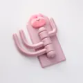 Süßer Cartoon-Rotations-Wandhaken, rosa Kunststoff-Mehrfachhaken für das Studentenwohnheim. - Großgesichthase