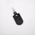 Estuche de cuero PU negro para llaves y tarjetas, con gancho metálico y cierre de botón. - Rectángulo-Negro