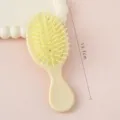 Petite brosse à cheveux à coussin d'air portable pour enfants, brosse de massage jaune. - Brosse pneumatique jaune clair