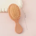 Mini brosse cheveux coussin d'air, peigne massage rose plastique pour enfants et femmes usage jour. - Brosse pneumatique marron contrasté