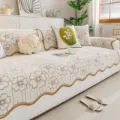 Minimalist chenille anti-slip sofa mat with elegant floral jacquard design and wavy edges. - 70x70cm / Brown