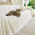 Nordisches minimalistisches dreilagiges Gaze-Sofabezug, einfarbiger universeller Sofaschoner. - 115*70CM / Beige